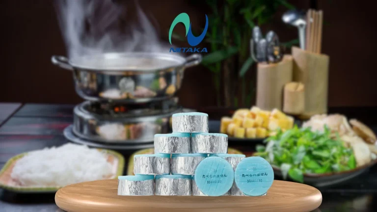 KAEN food warmer candle on a food platform with a hotpot background