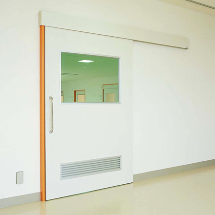 pintu sliding otomatis berwarna putih dan oranye dengan teknologi tertutup otomatis